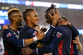 Oct. 01, 2016; Foxborough, MA, USA; New England Revolution Forward Juan Agudelo (17) congratulates teammate Kei Kamara (23) after Kamara scored a goal during an MLS match between Sporting Kansas City and the New England Revolution at Gillette Stadium. Photo credit: Jay Anderson - KLC fotos